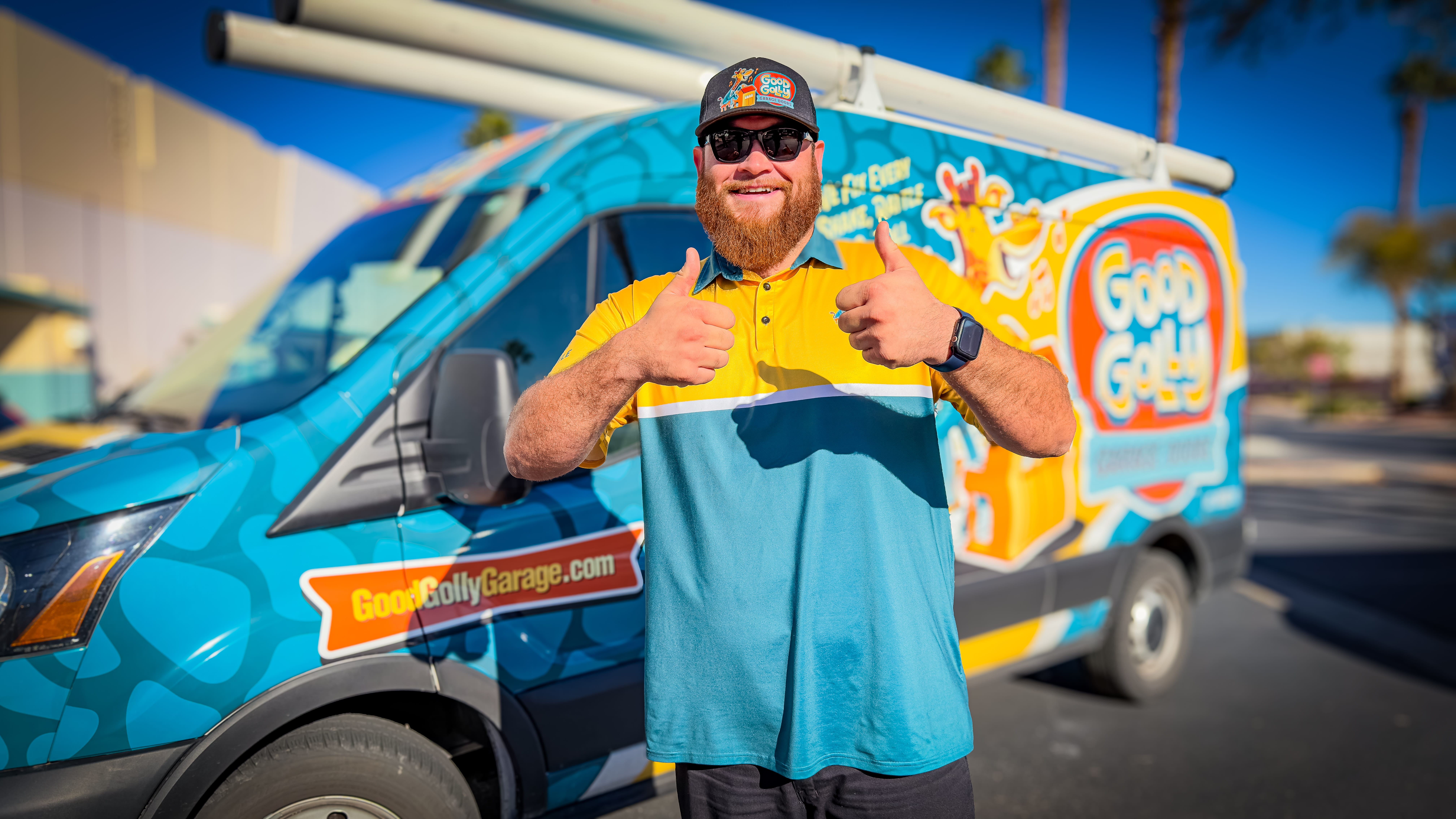 Good Golly Garage Doors technicians repairing a garage door